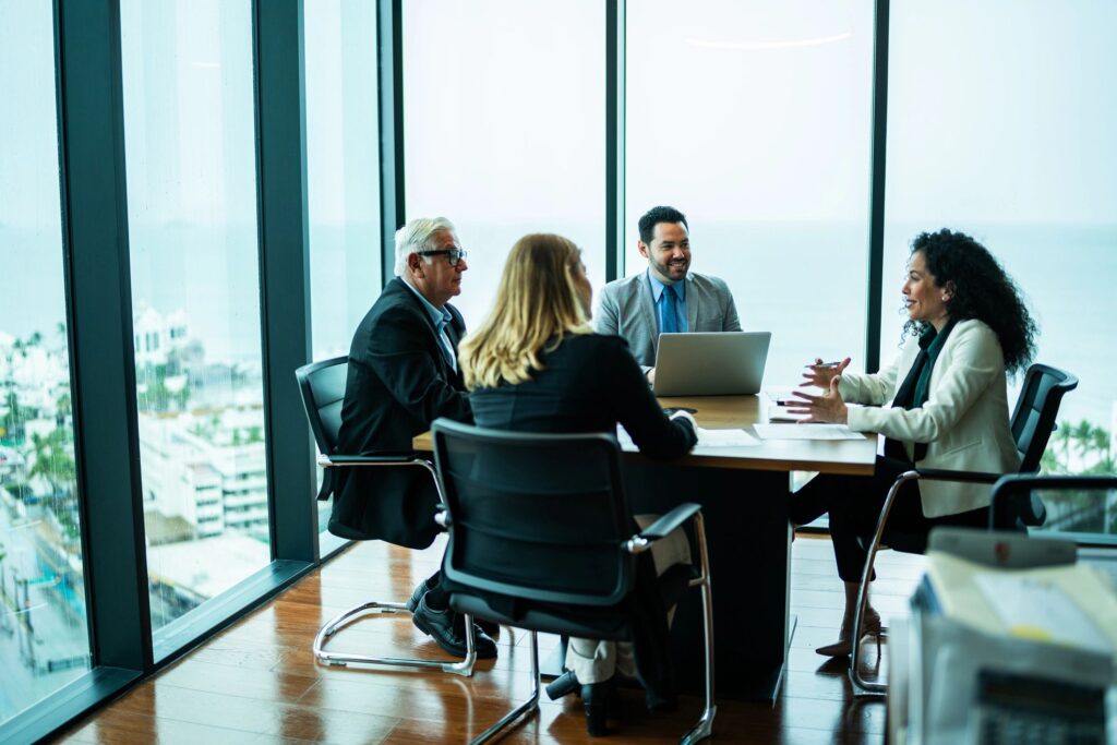 Coworkers talking on business meeting on office